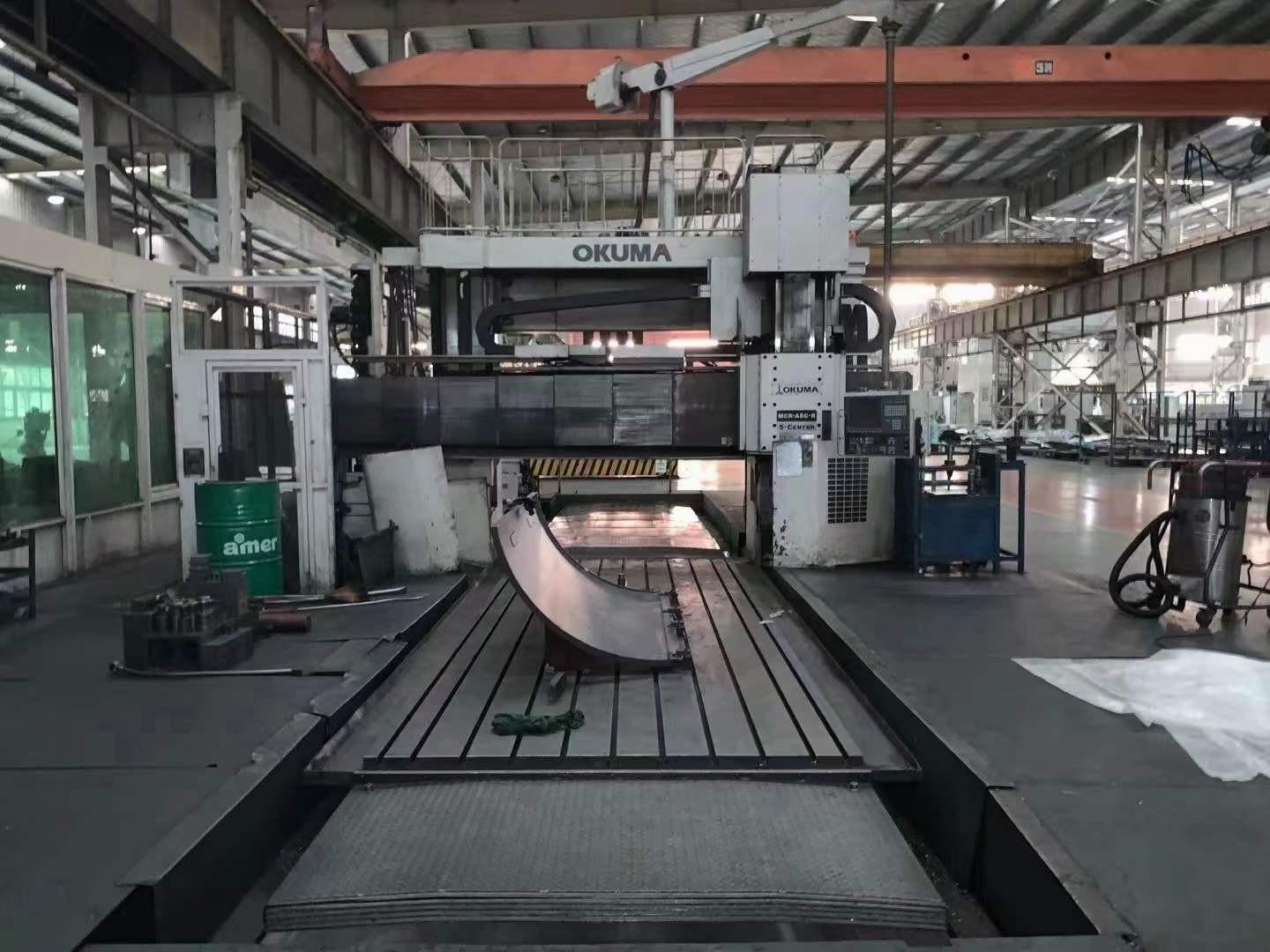 Pentahedral gantry processing center