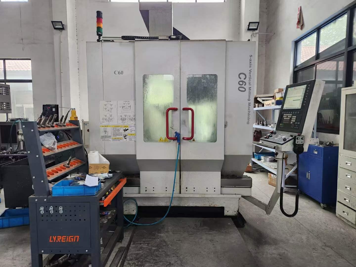 Five axis machining center