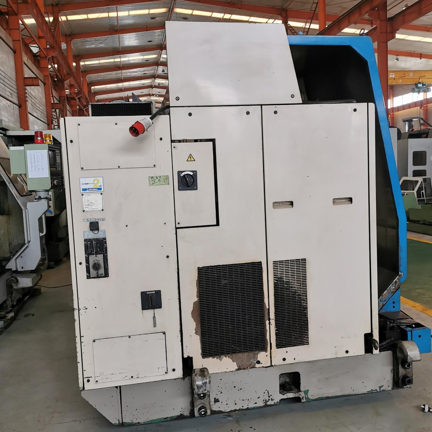 CNC lathe with inclined rail