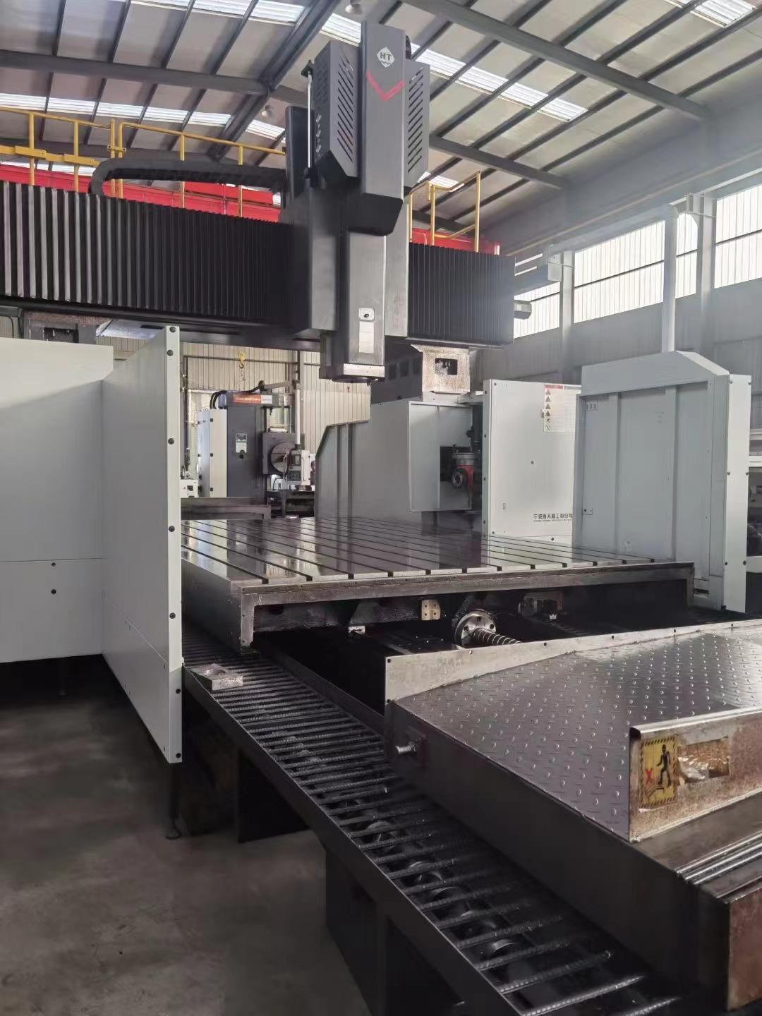 Fixed beam gantry machining center