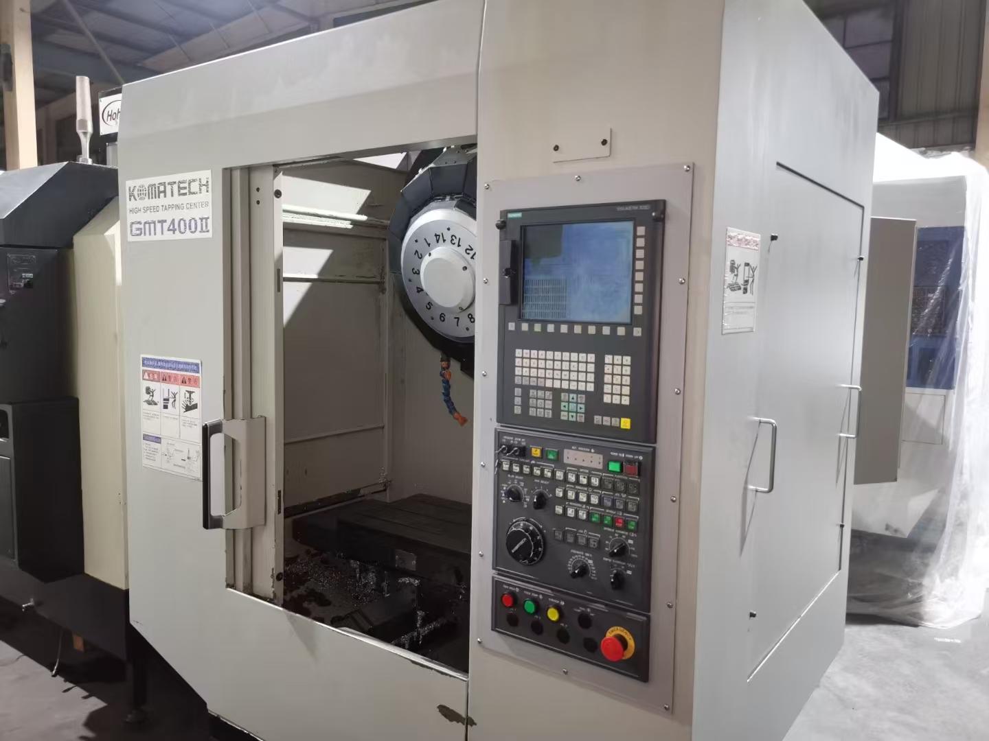 Drilling and tapping machine