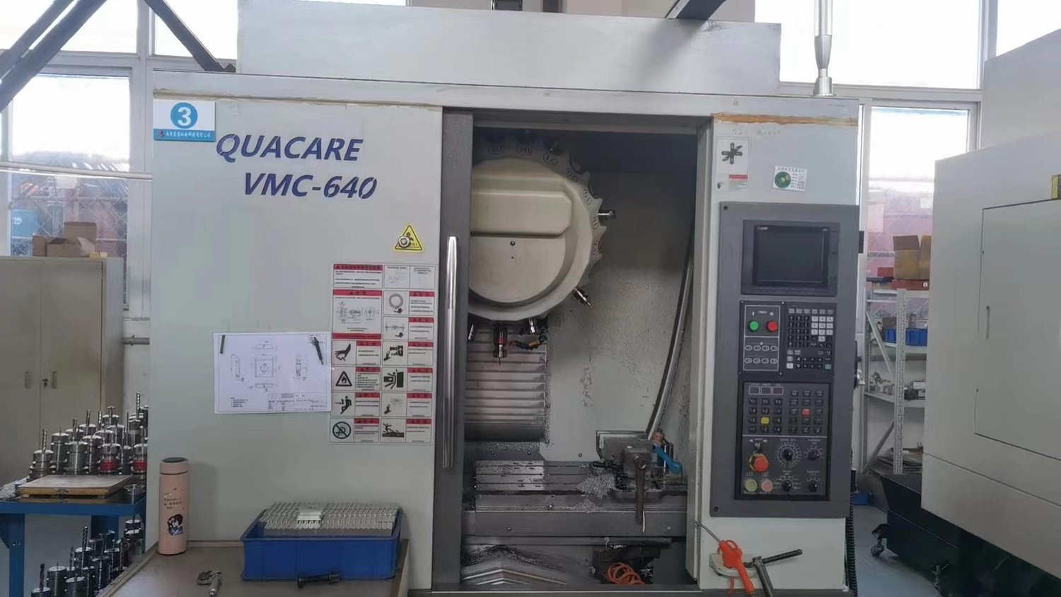 Drilling and tapping machine