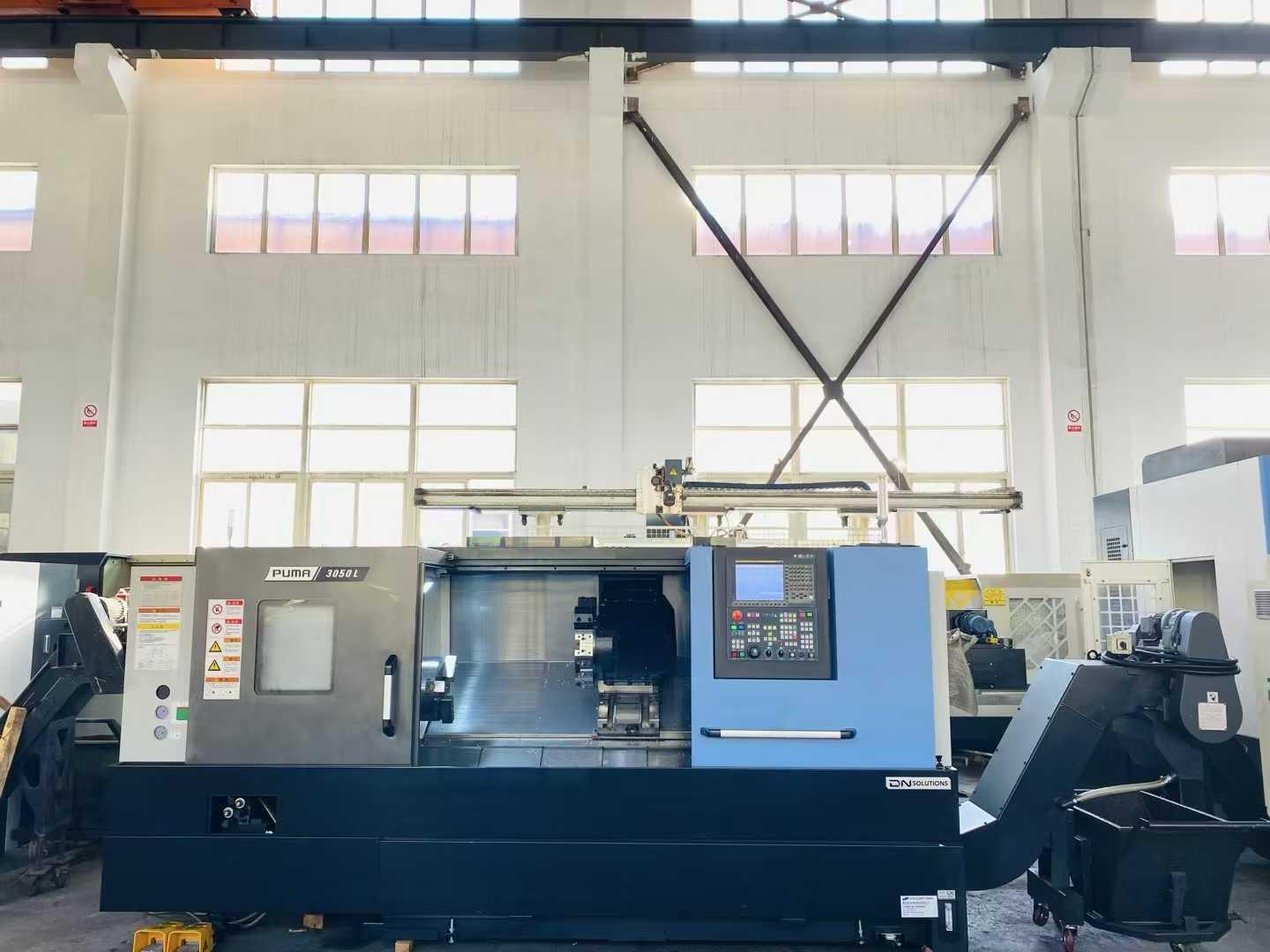 Inclined rail turret machine